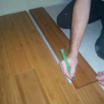 Flip the board around and make your mark. Use the left over cutoff piece - when it's long enough - to start the next row. It's that simple!