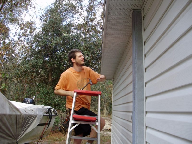 Author Eric Brennan and Vinyl Siding