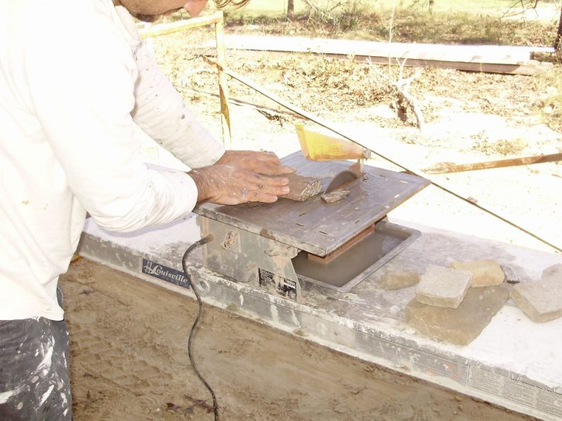 Ugly Randy cuts stone on a cheap tile wet saw