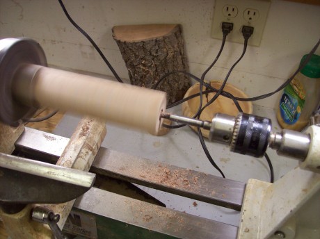 Drilling a 1/2 wide hole in the center of the blank.