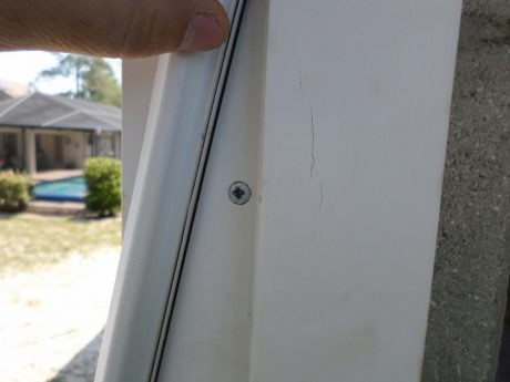Tapcon installed and hidden by the weatherstripping