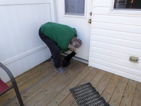 Mean-Mean first inspects the door for proper layout