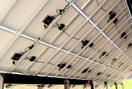 Microinverters mount right behind the panels.