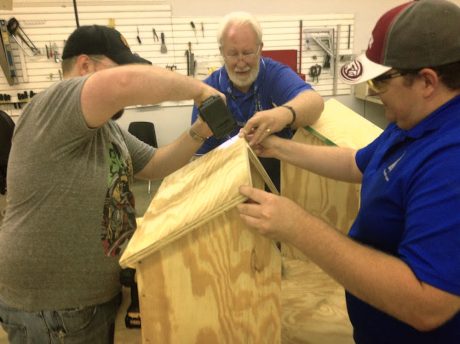 The boys at the MakerSpace at work.