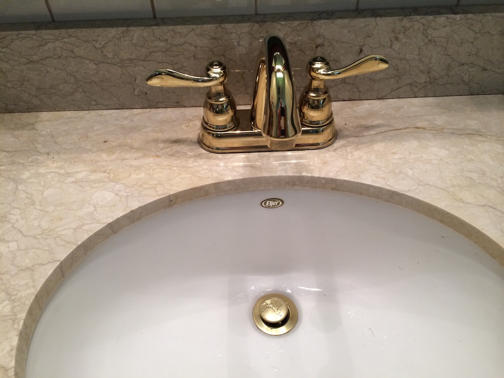 bathroom faucet leaks under sink