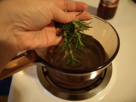 Chop up herbs and heat vinegar