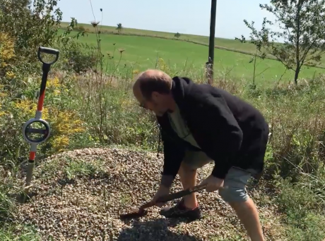Moving rock with a shovel is painful.