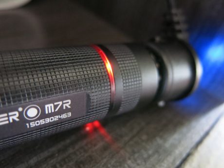A subtle light indicates battery charge status