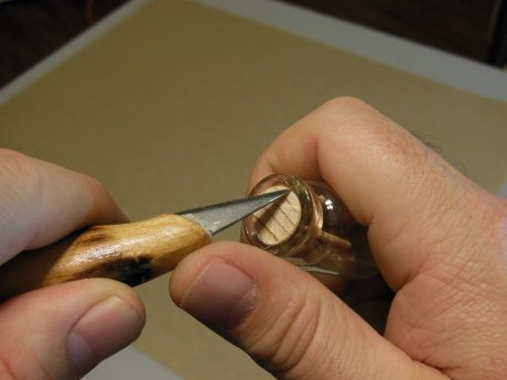 Chamfering top edge