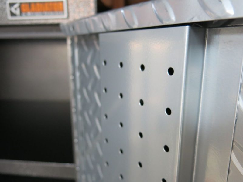 A vertical pegboard runs on the inside of both doors - but we didn't use it