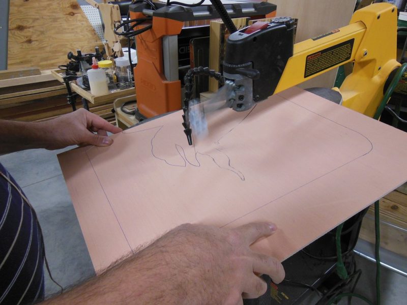 Cutting layers with a scroll saw