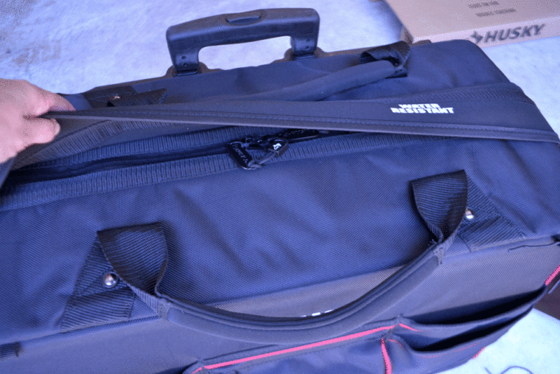 Husky rolling tote rain flap