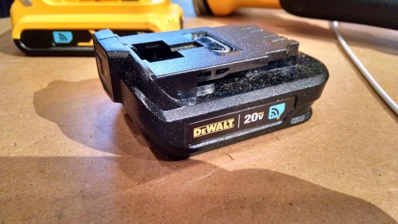 adapter that connects between the tool and the battery pack