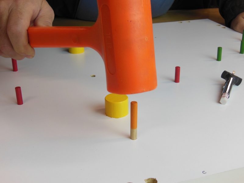 Driving the pegs