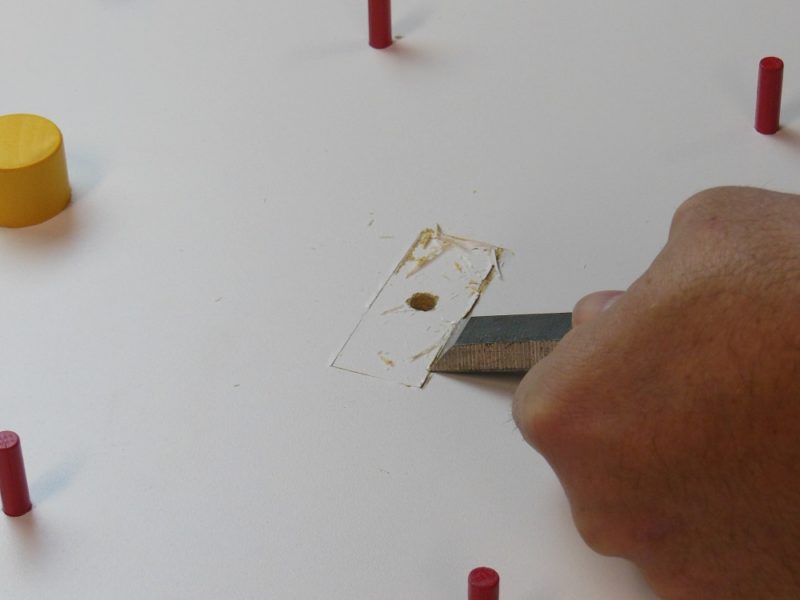 Cutting away the melamine