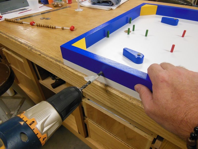 Drilling to mount score keeper