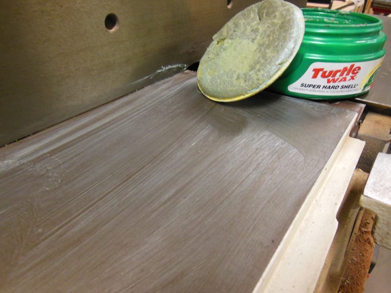Waxing the jointer.