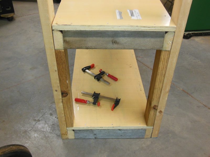 Spacers support the shelves.