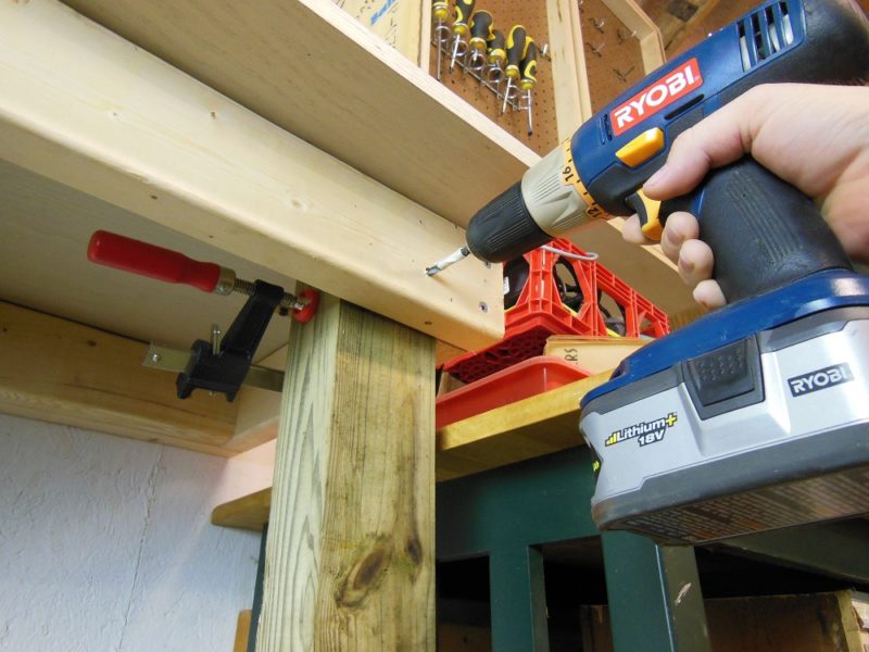 Drilling for lag screws.