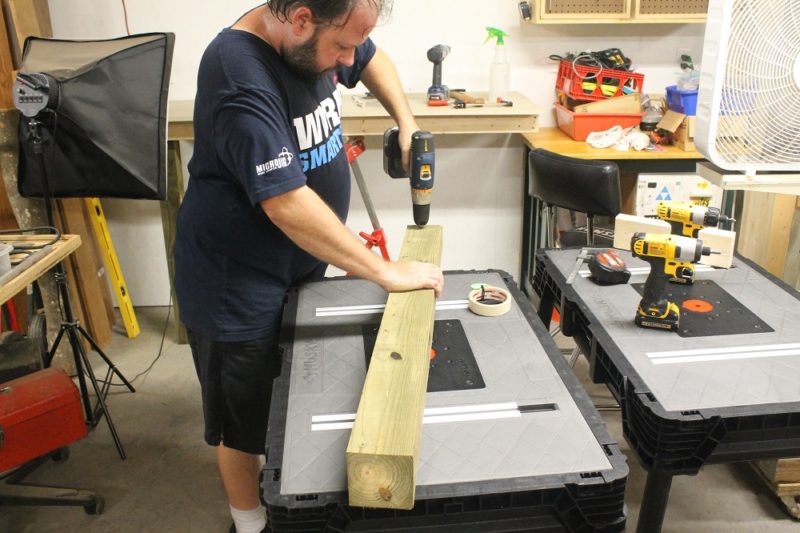 Deepening the pilot holes.