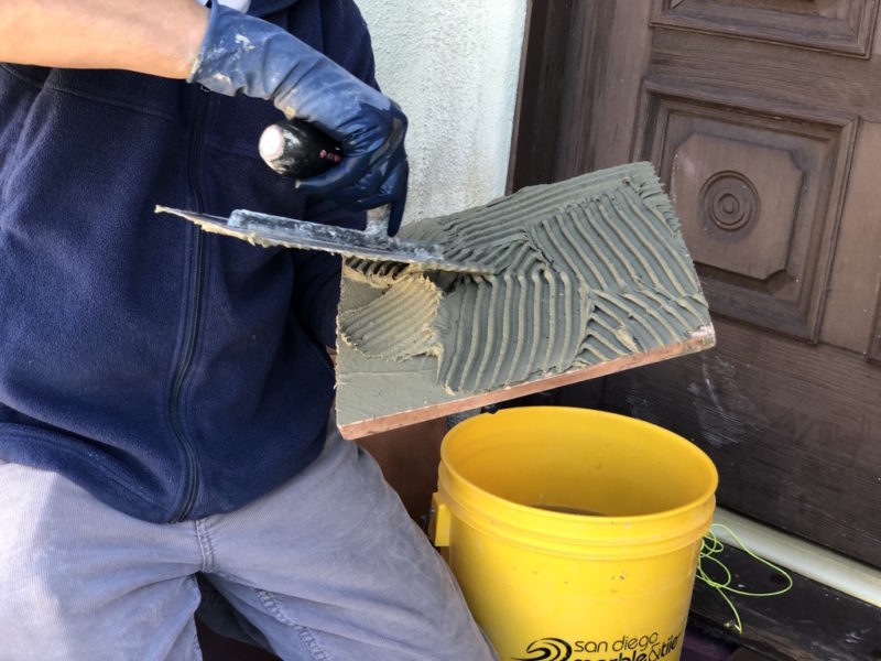 notched trowel backbutter
