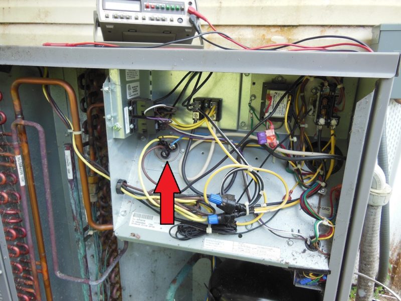 Find the motor run capacitor.