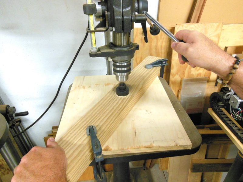 Drilling 1-3/4" hole.