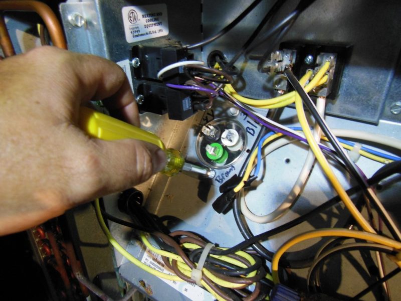 Installing the new capacitor.