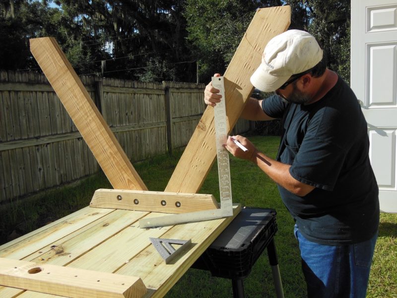 Measuring for bench support position.