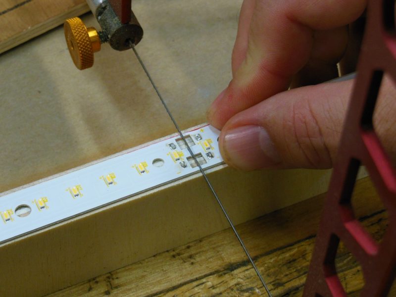 Sawing in half.