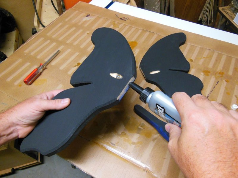 Attaching the wooden butterfly wings.