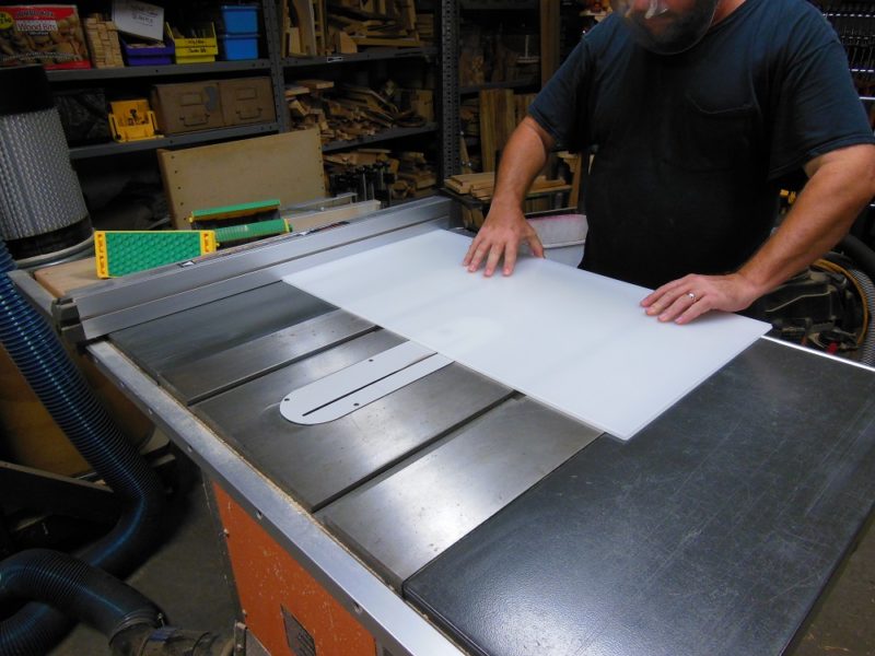 Cutting acrylic sheeting on the table saw.