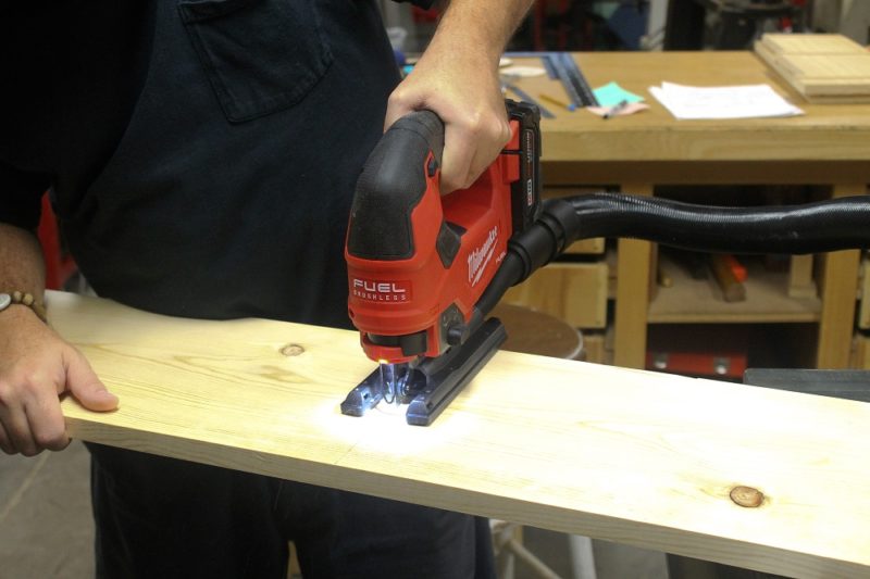 Cutting shelves to length.
