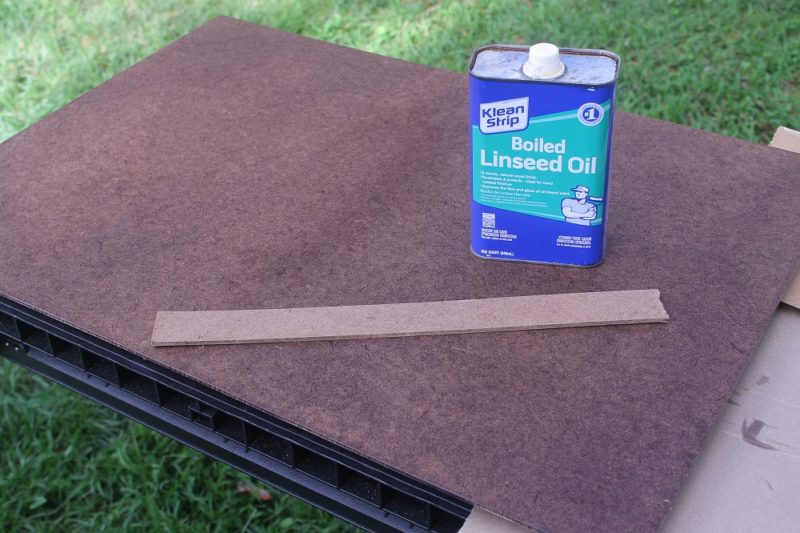 Oil rubbed hardboard.