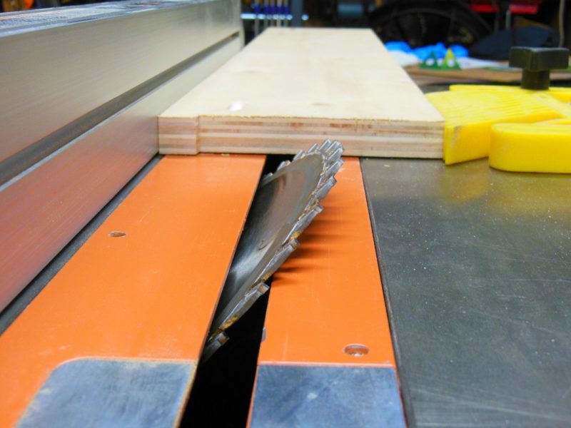 Table saw blade tilted to 45°