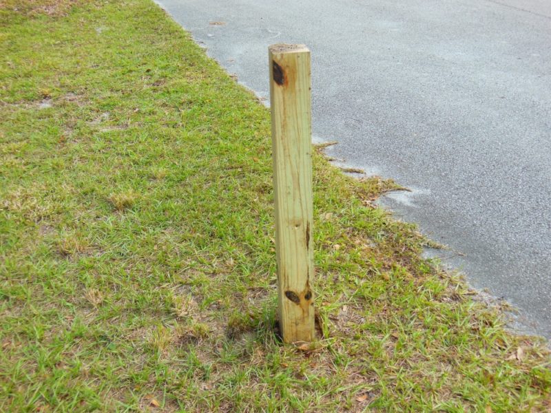 Out with the old mailbox and post.