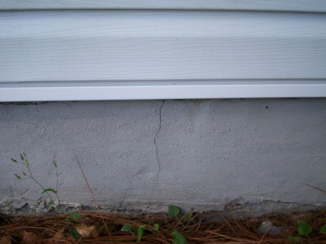 Cracks in the foundation should at the very least be sealed before ice can make them bigger