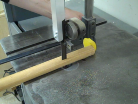 One way to slice off a flat section of the dowel