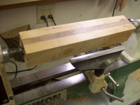 4' from each end give you plenty of wiggle room to shape the handles and leave enough bulk for turning.
