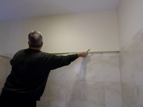 Measuring over from nail to wall to transfer below