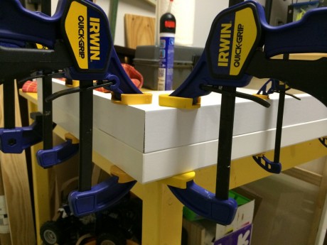 Clamping for crown backer