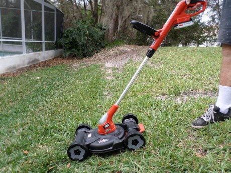Tiny mower, weed trimmer or driveway edger? You decide