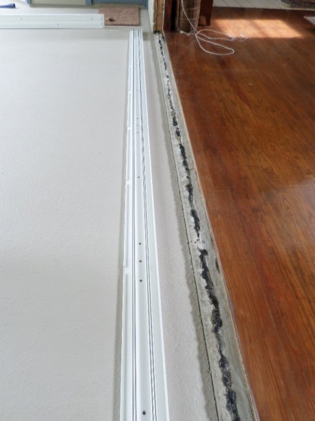 The tracks out and the area has been shop vacuumed.
